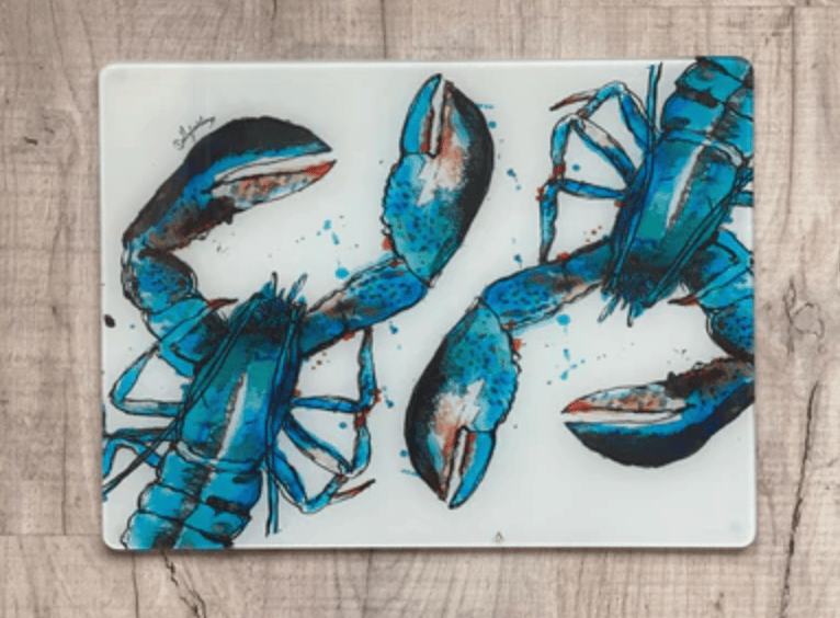 Placemat with blue lobster design on a wooden surface