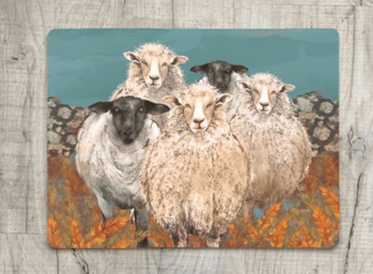 Placemat with illustration of five sheep on a wooden surface