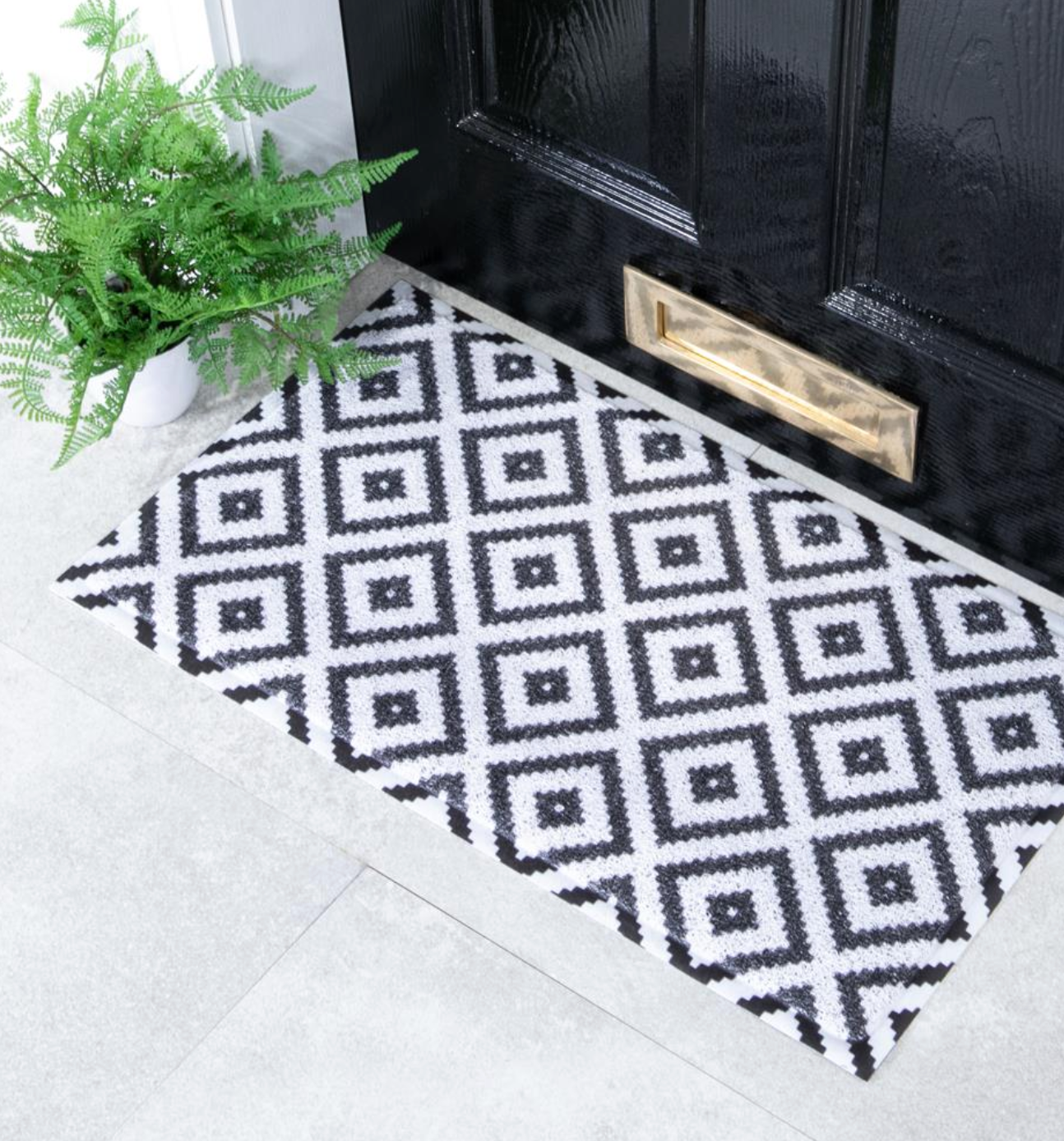 Noodle Outdoor Doormat by Artsy Mats | Turquoise Living