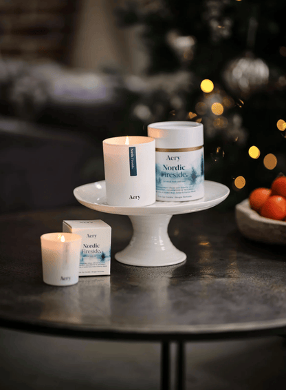 Aery Nordic Breathing products on a table with a blurred Christmas tree in the background