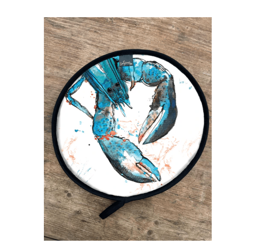 Aga Cover with a blue lobster design on a wooden surface