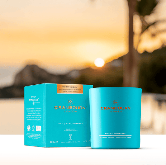 Blue glass Sunset in Ibiza candle with sunset background by Cranbourn London