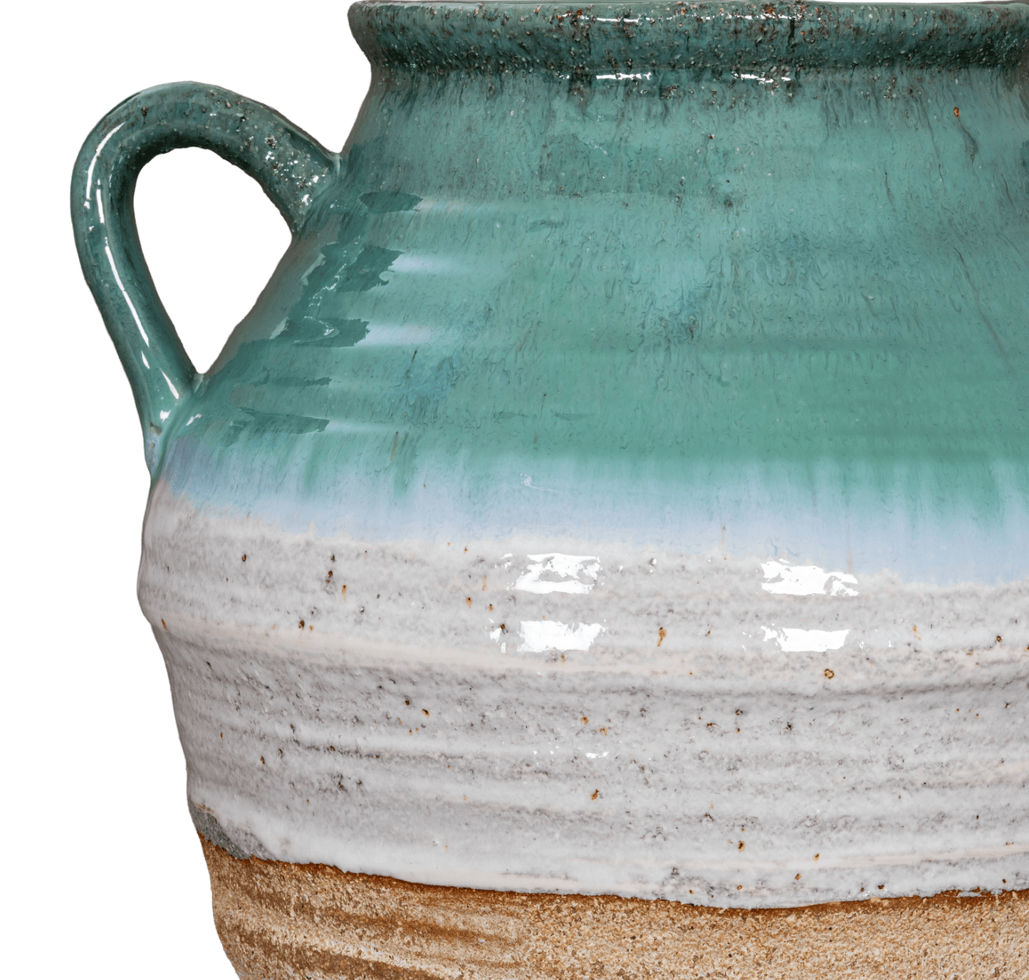 Close-up of a ceramic vase with a gradient color from green to white on a white background