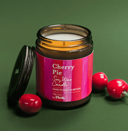Cherry Pie candle with a pink label on a green background