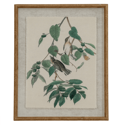 Framed artwork of birds on a branch with leaves