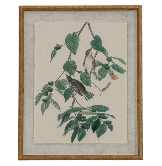 Framed artwork of birds on a branch with leaves