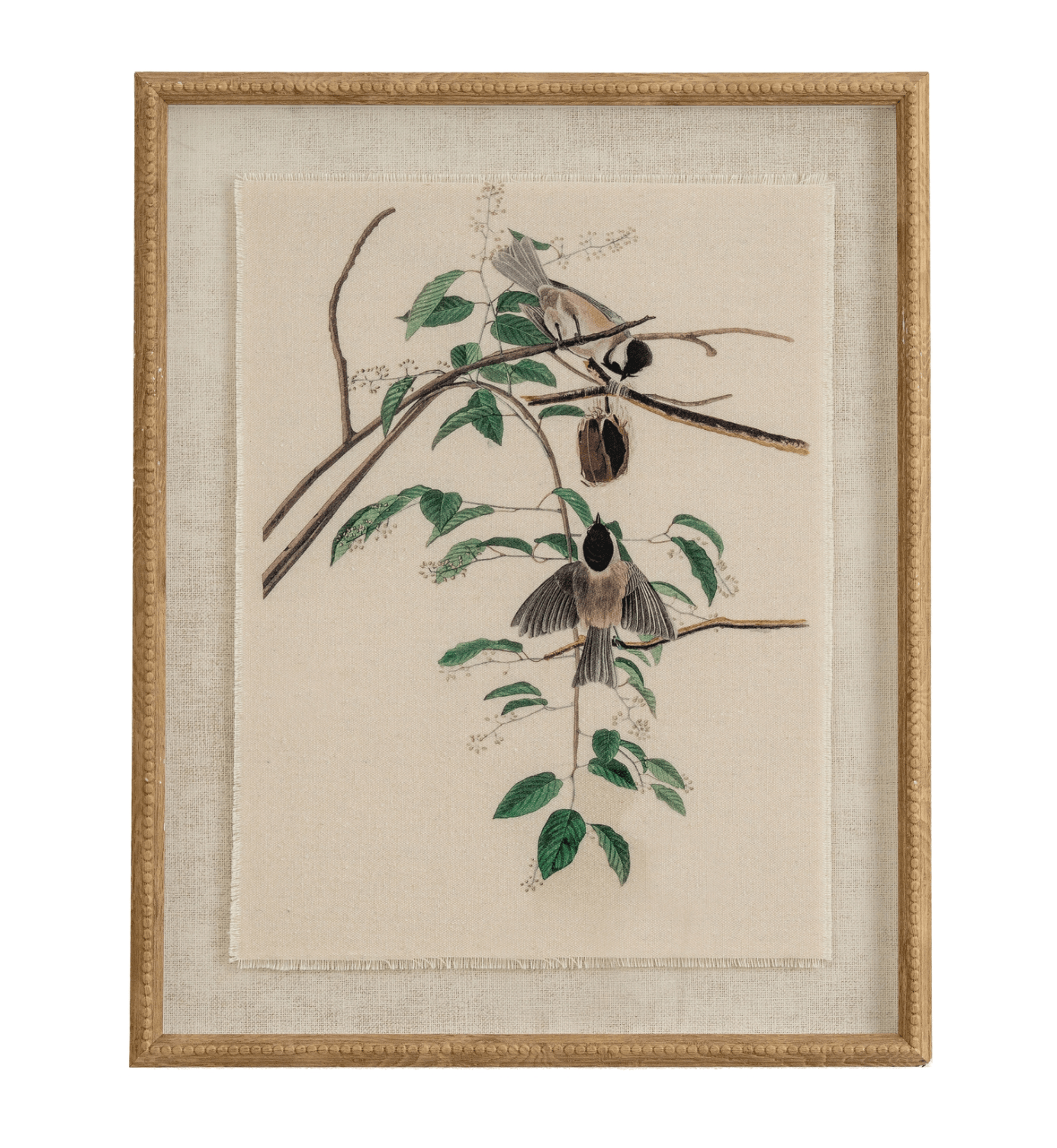 Framed artwork of birds on a branch with leaves