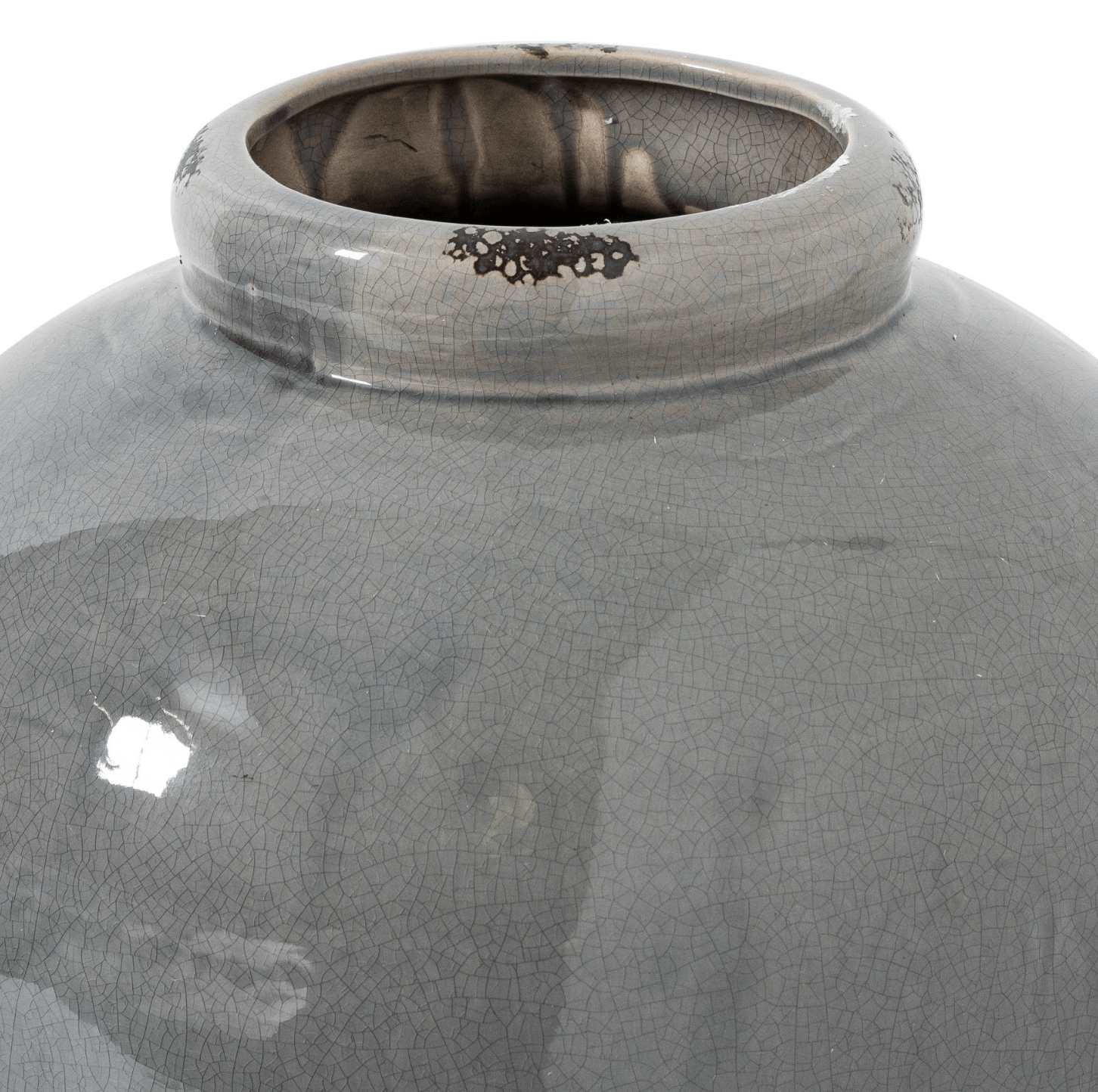 Close-up of a gray ceramic vase with a textured surface on a white background