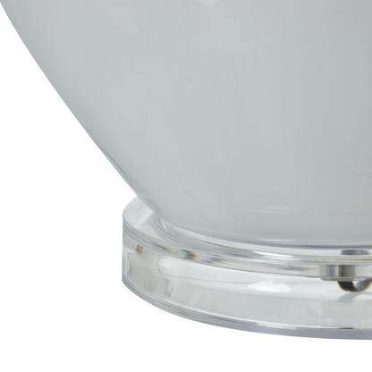Close-up of a white bowl with a clear base on a white background