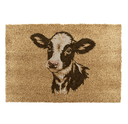 Doormat with a cow illustration on a beige background