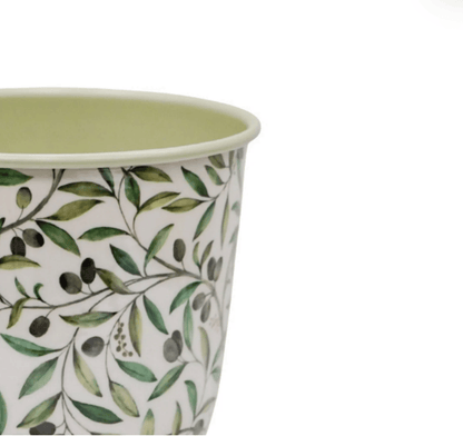 Planter with green leaf pattern on a white background
