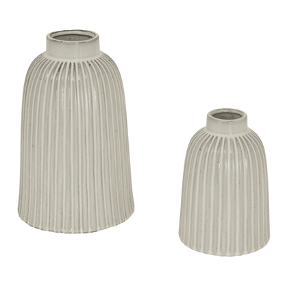 Two ribbed ceramic vases on a white background