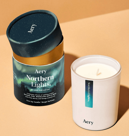 Aery Northern Lights candle and packaging on a beige background