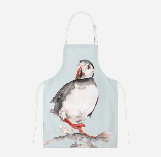 Apron with a puffin design on a light blue background