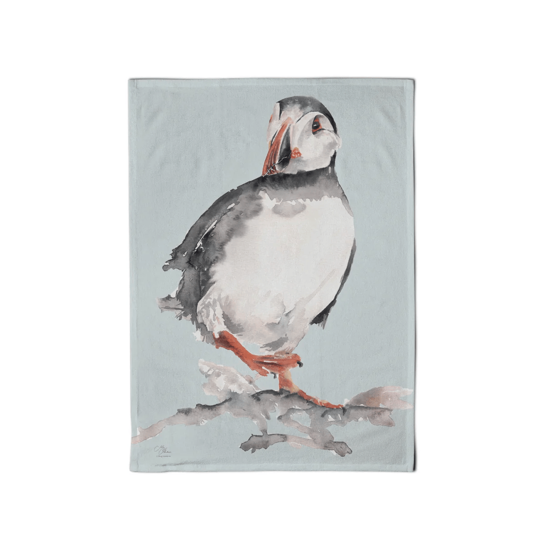 Fleece blanket with a puffin design on a light blue background
