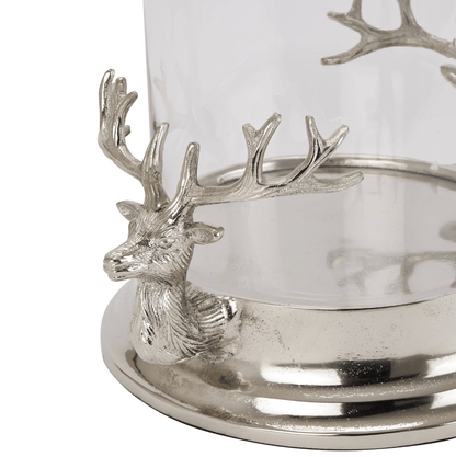 Silver deer head and antler design on a cylindrical container with a white background