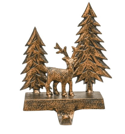 Bronze sculpture of a deer between two trees on a white background