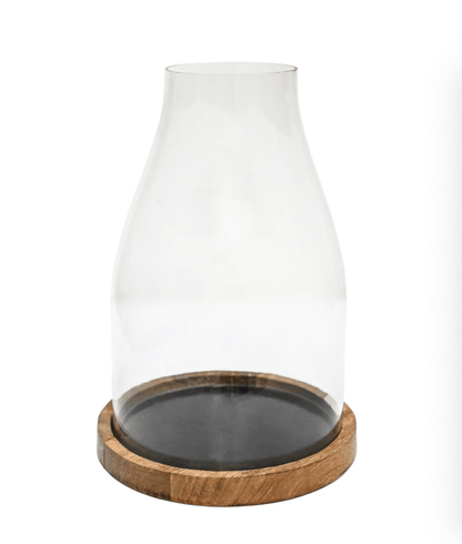 Clear glass bell-shaped vase with a natural wood base, shown on a plain white background.
