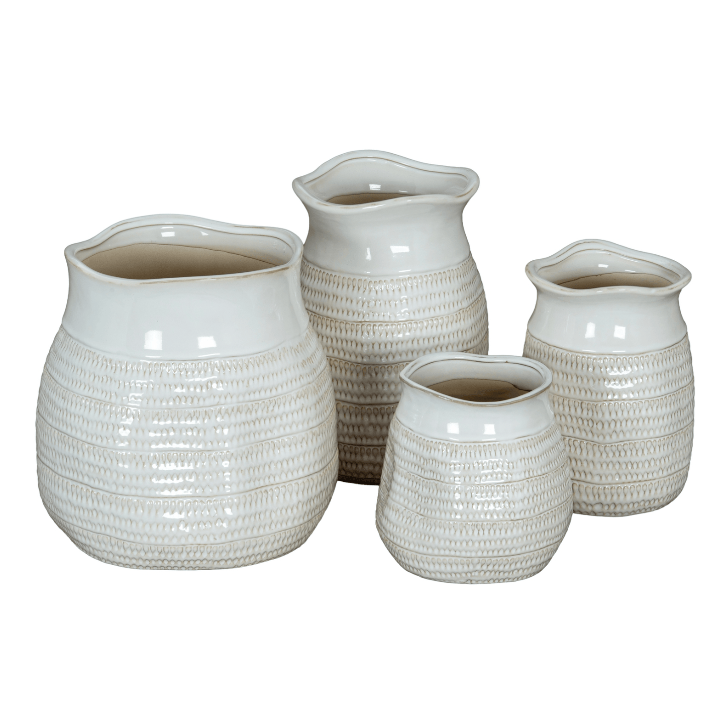 Set of four textured ceramic vases on a white background