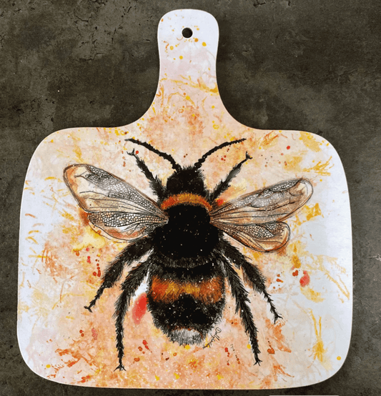 Chopping board with colourful Bee design by Dollyhotdogs