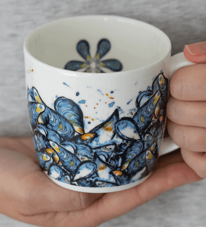 Person holding a Dollyhotdogs Bone China Mug Mussels Design 