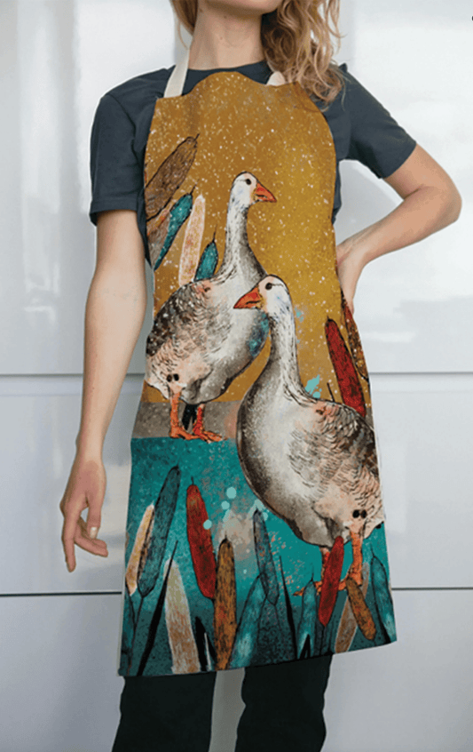 100% cotton apron by Dollyhotdogs with a Christmas Goose design