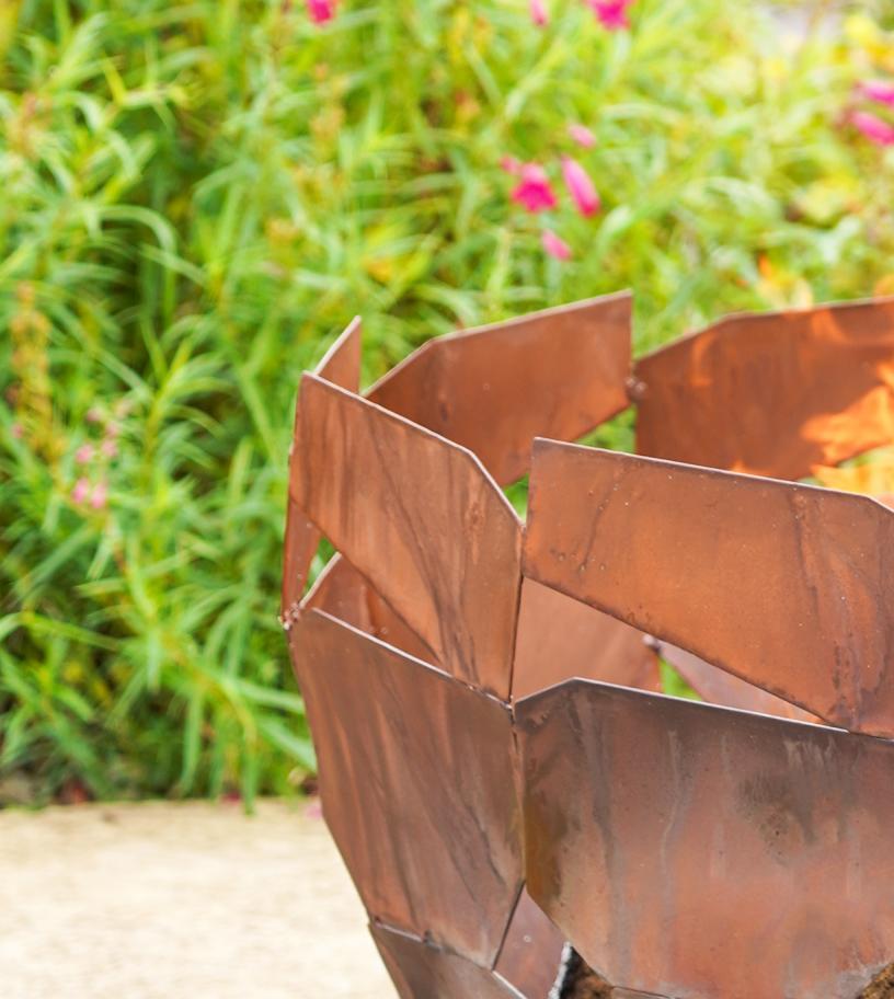 Ivyline Rust Finish Metal Industrial Fire Bowl Closeup