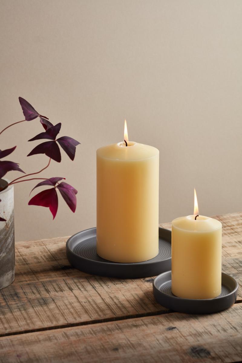 Matt Dark Grey Candle Plate by  St. Eval With Burning Pillar Candles